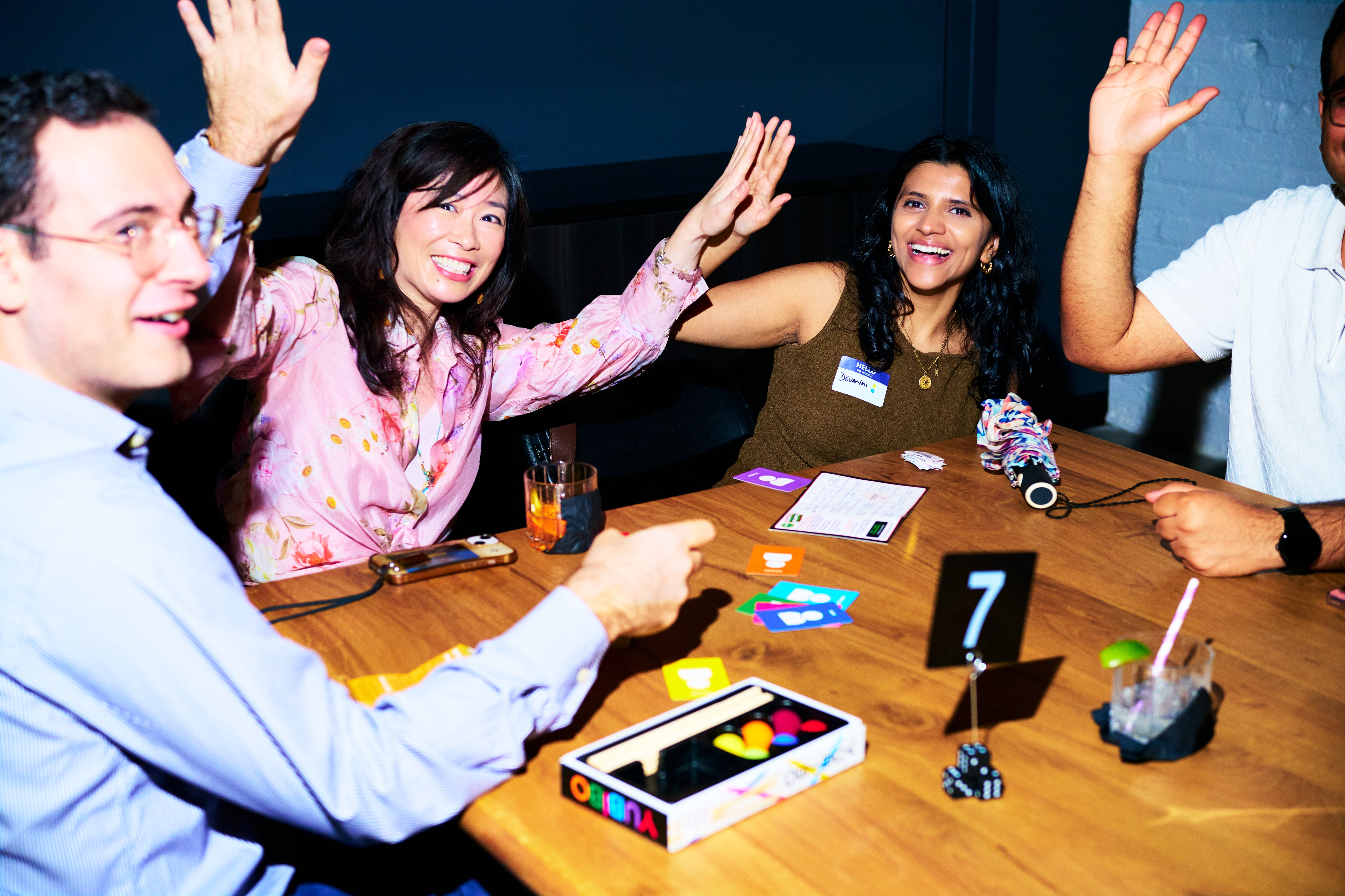 Concept render of guests at a game table